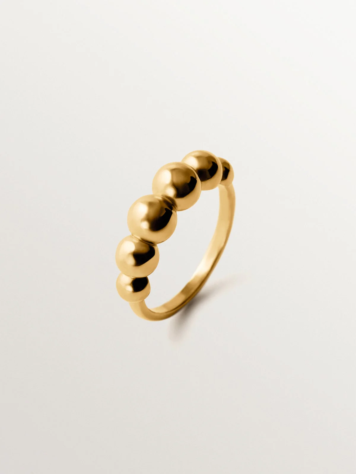 Anillo de plata 925 bañada en oro amarillo de 18K con motivo de esferas