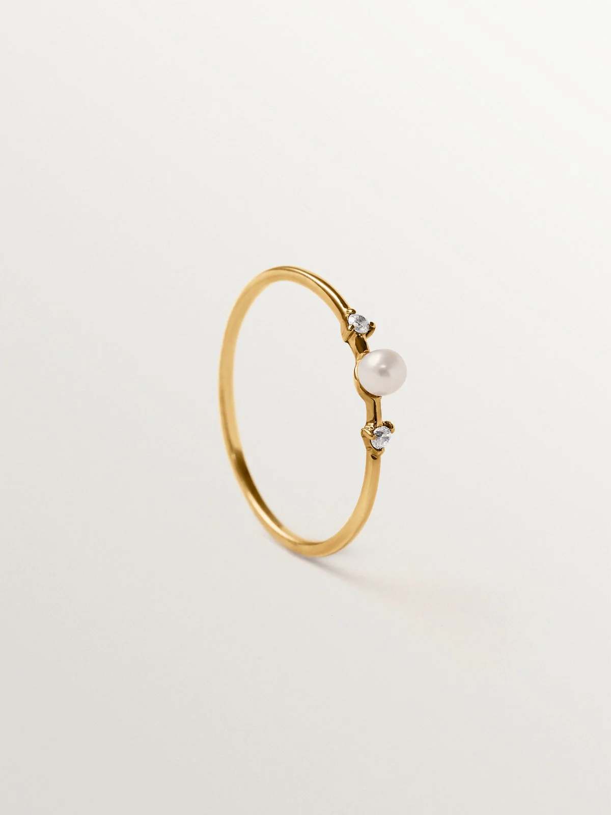 Anillo de plata 925 bañada en oro amarillo de 18K con perla y topacios blancos - Image 5