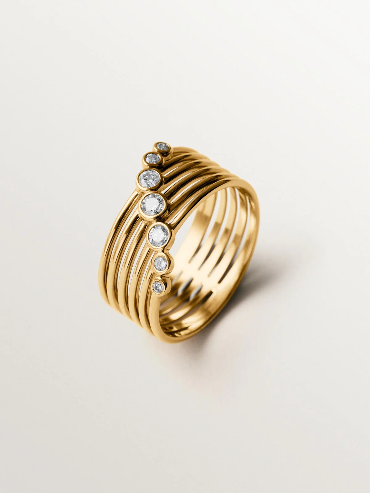Anillo multibrazo de oro blanco y amarillo de 9K con diamantes en talla brillante