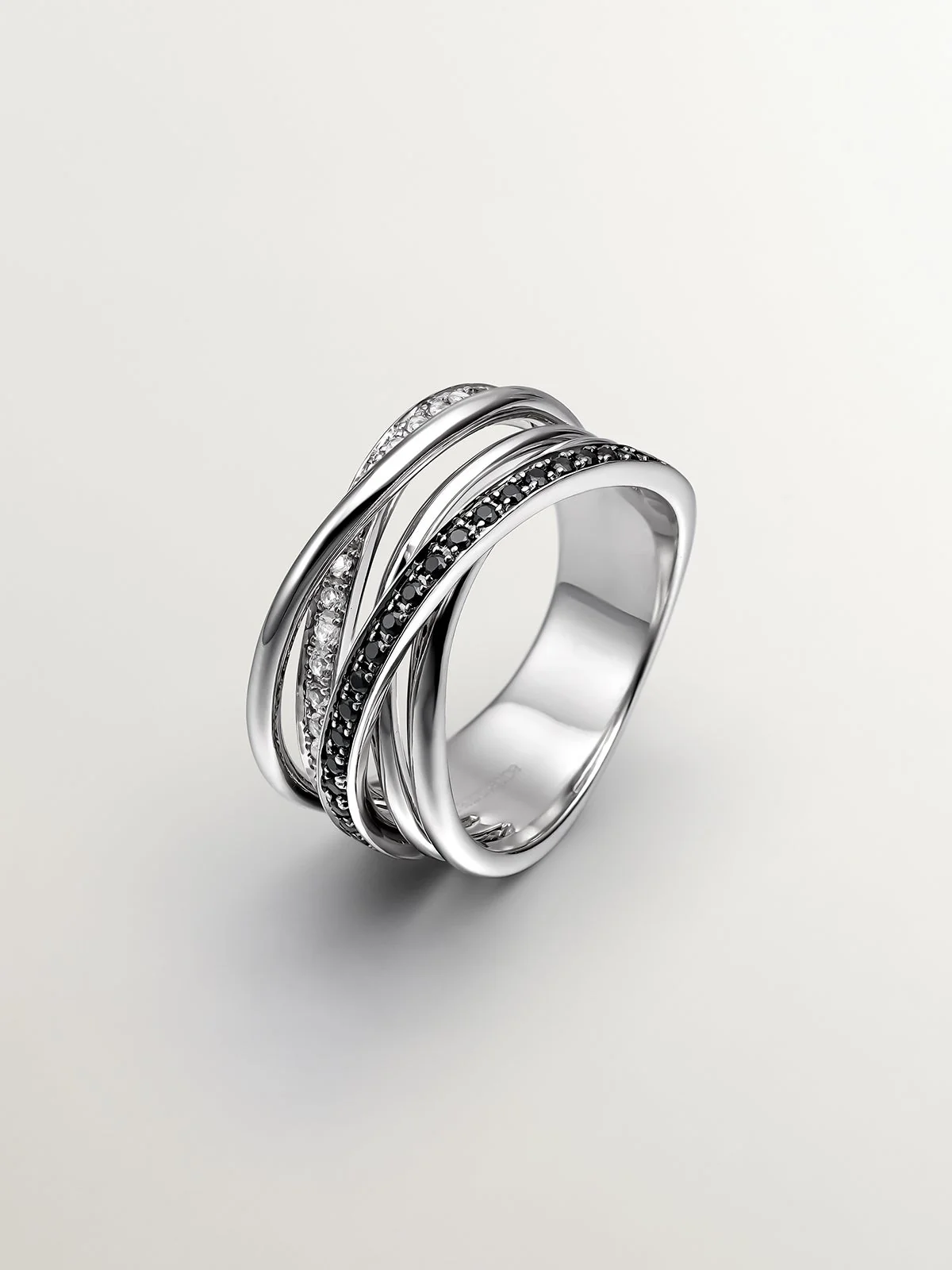 Anillo multibrazo de plata 925 con topacios blancos y espinelas negras