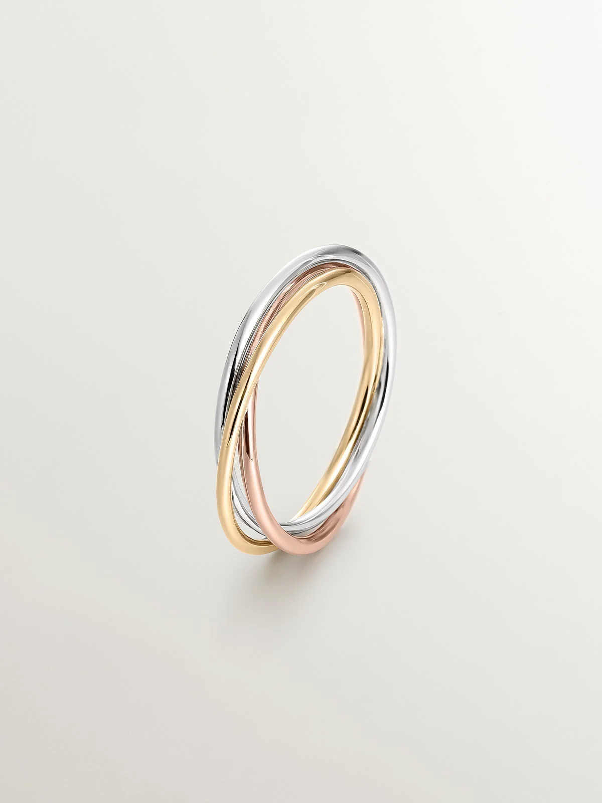 Anillo triple de oro blanco, amarillo y rosa de 9K
