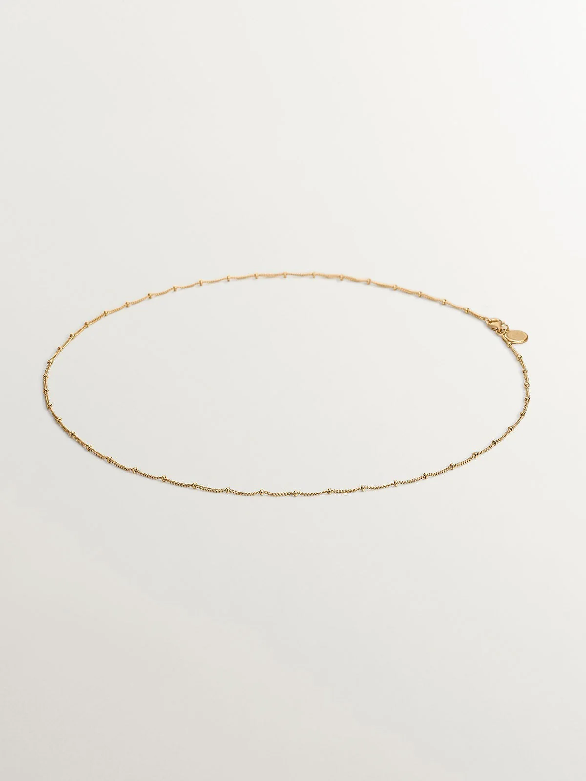 Cadena de plata 925 bañada en oro amarillo de 18K con bolitas