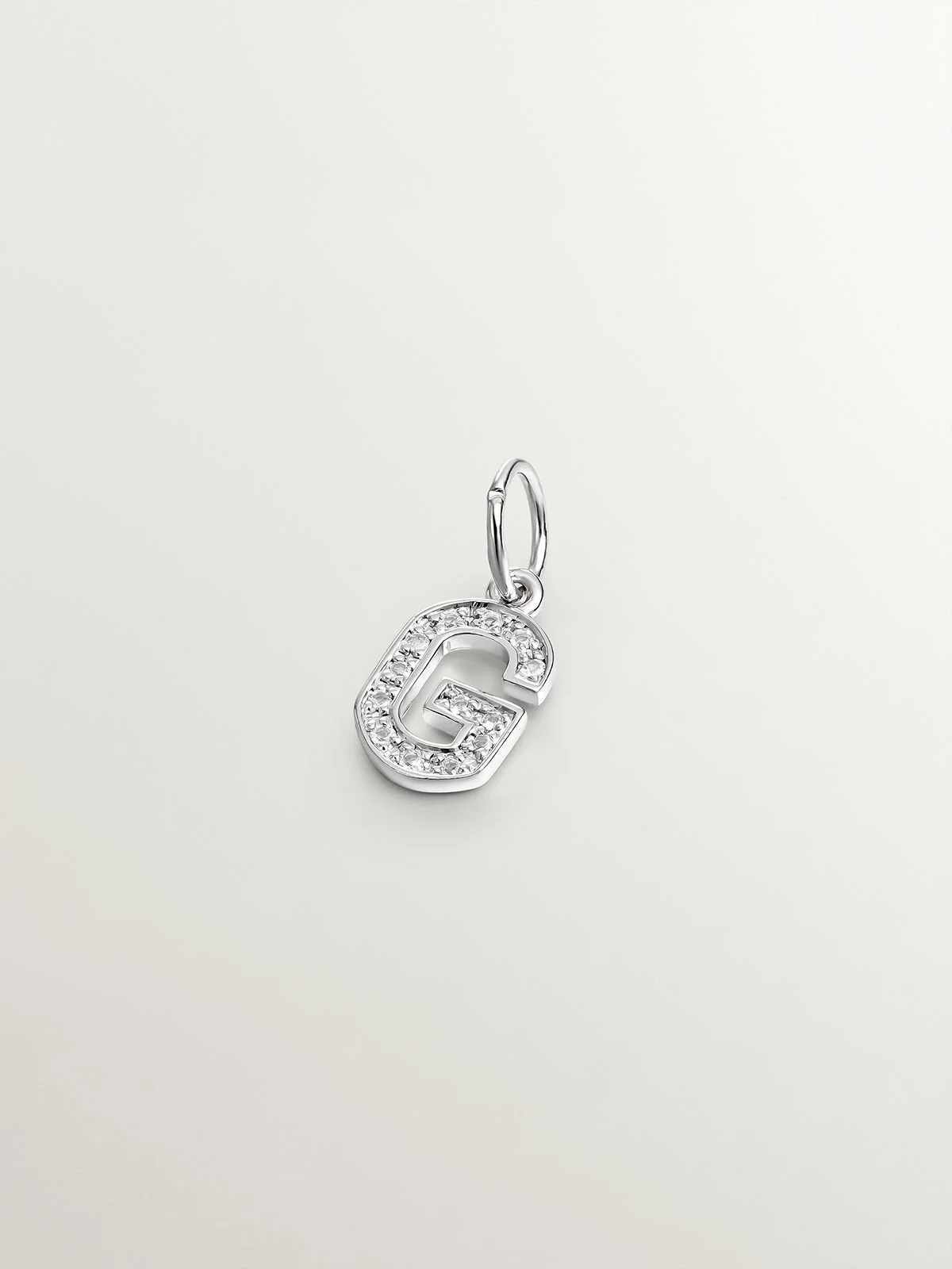Charm de plata 925 y topacios blancos inicial G