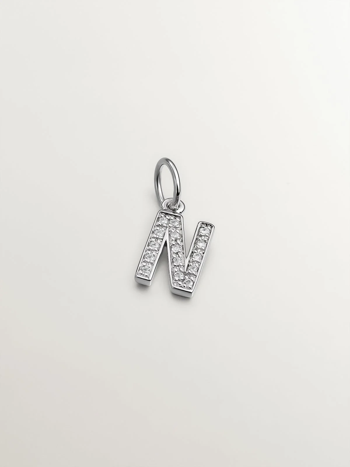 Charm de plata 925 y topacios blancos inicial N