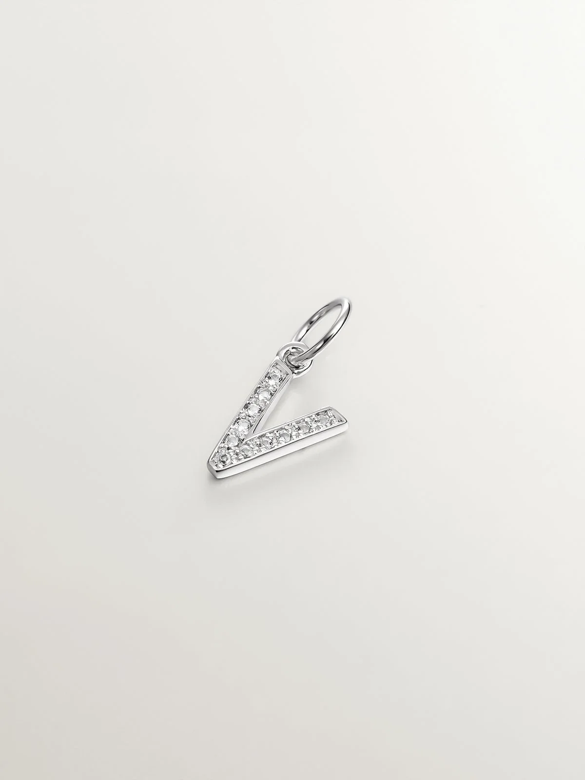 Charm de plata 925 y topacios blancos inicial V