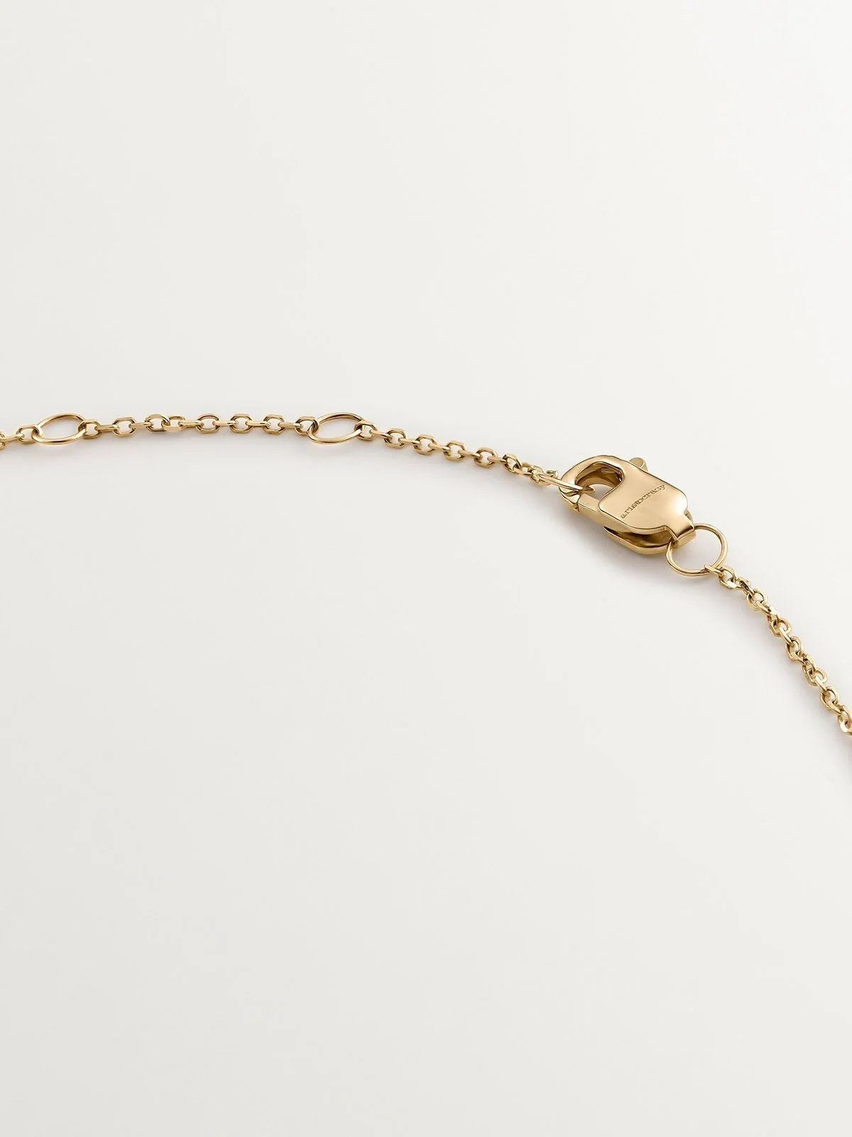 Colgante de oro amarillo de 9K con zafiro azul - Image 7