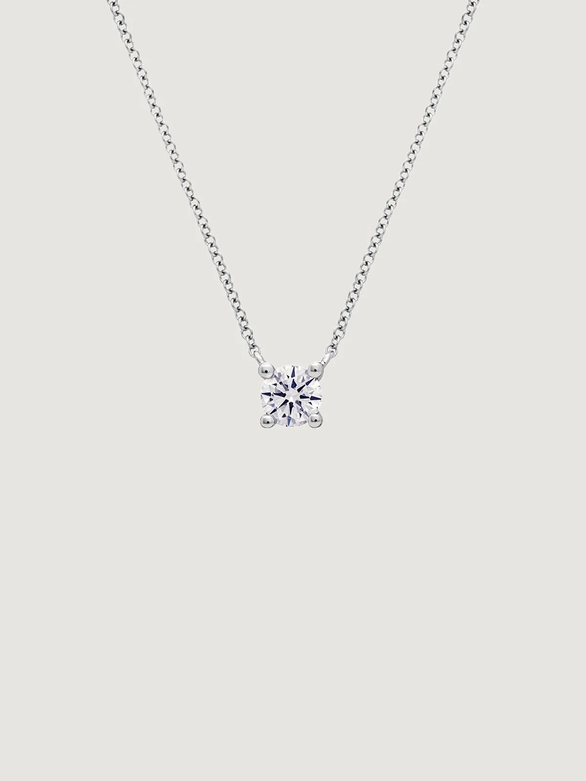 Colgante de oro blanco de 18K con diamante 0,1 cts