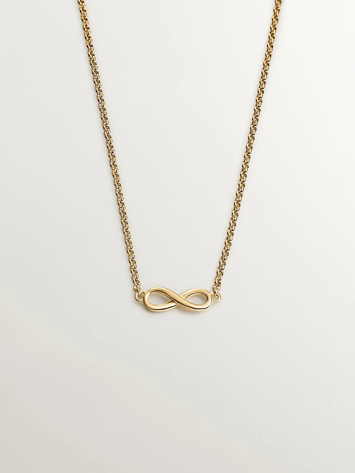 Colgante de plata 925 bañada en oro amarillo de 18K con infinito
