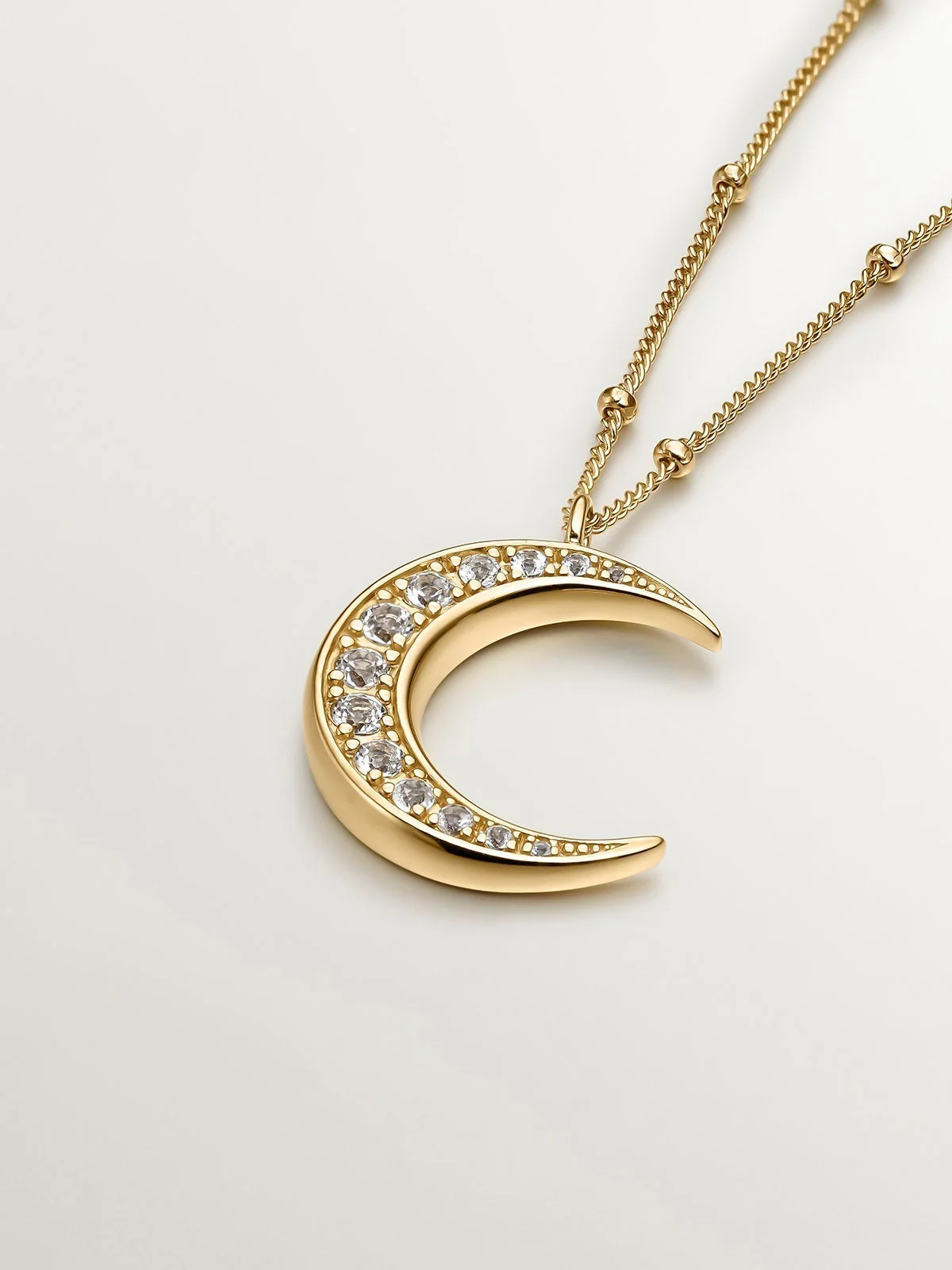 Colgante de plata 925 bañada en oro amarillo de 18K con luna y topacios blancos - Image 3