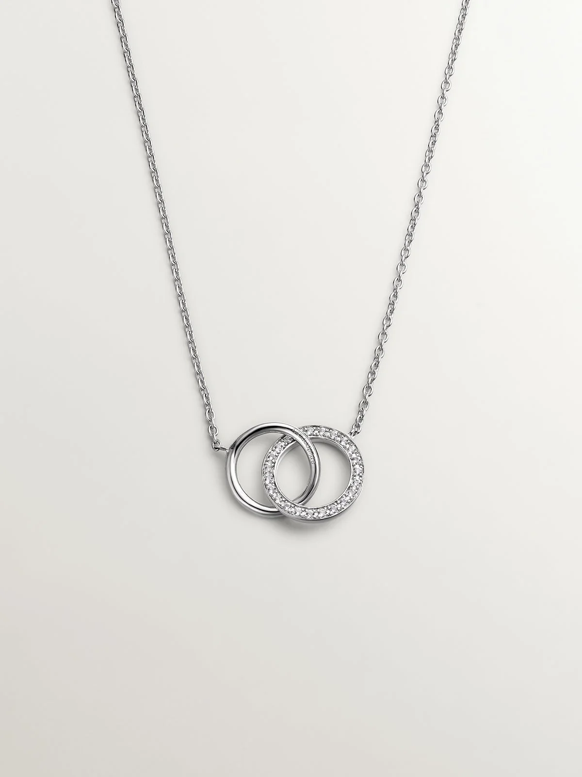 Colgante de plata 925 con círculos y topacios blancos