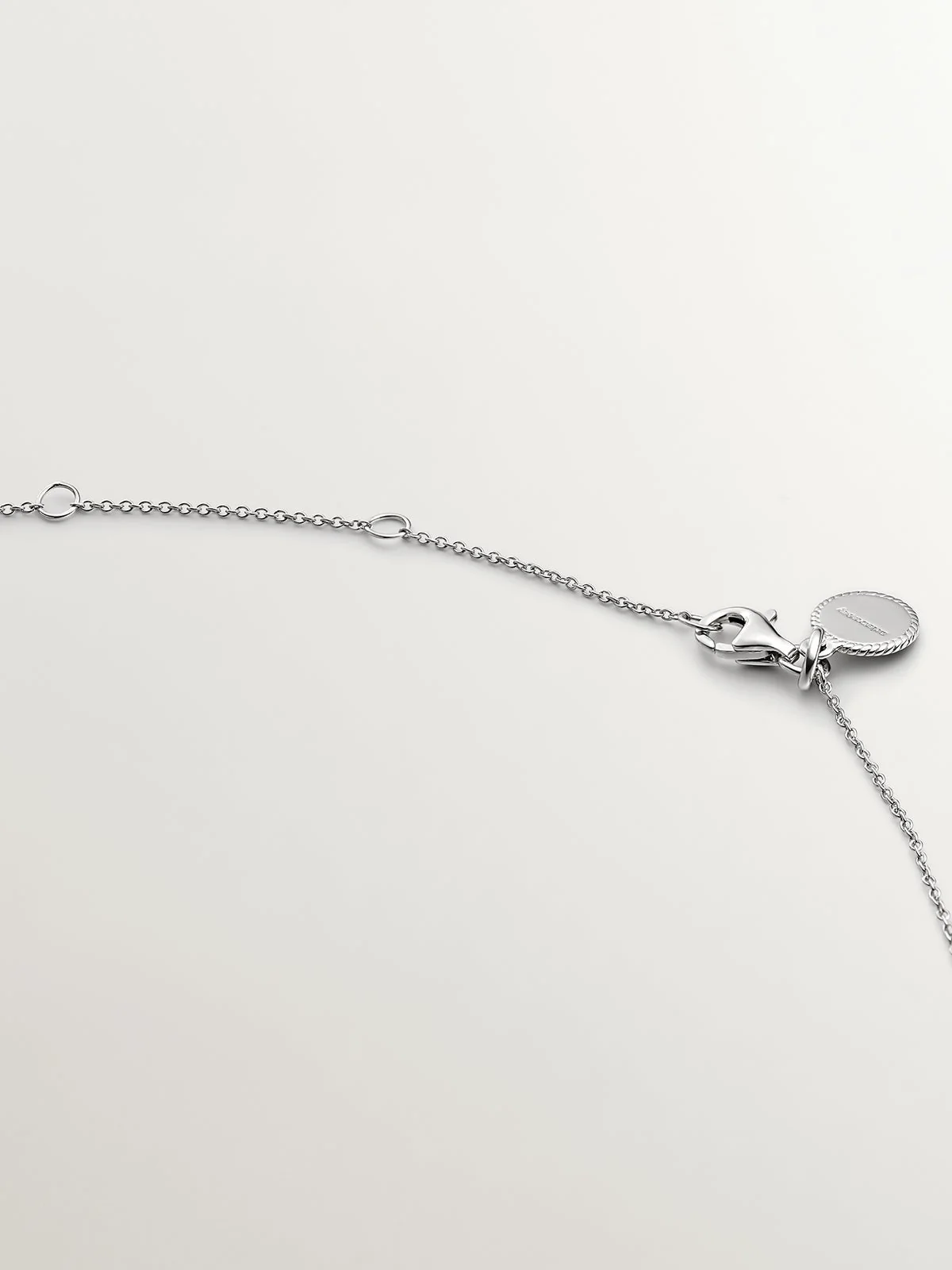 Colgante de plata 925 con topacio blanco y orla de zafiros blancos - Image 7