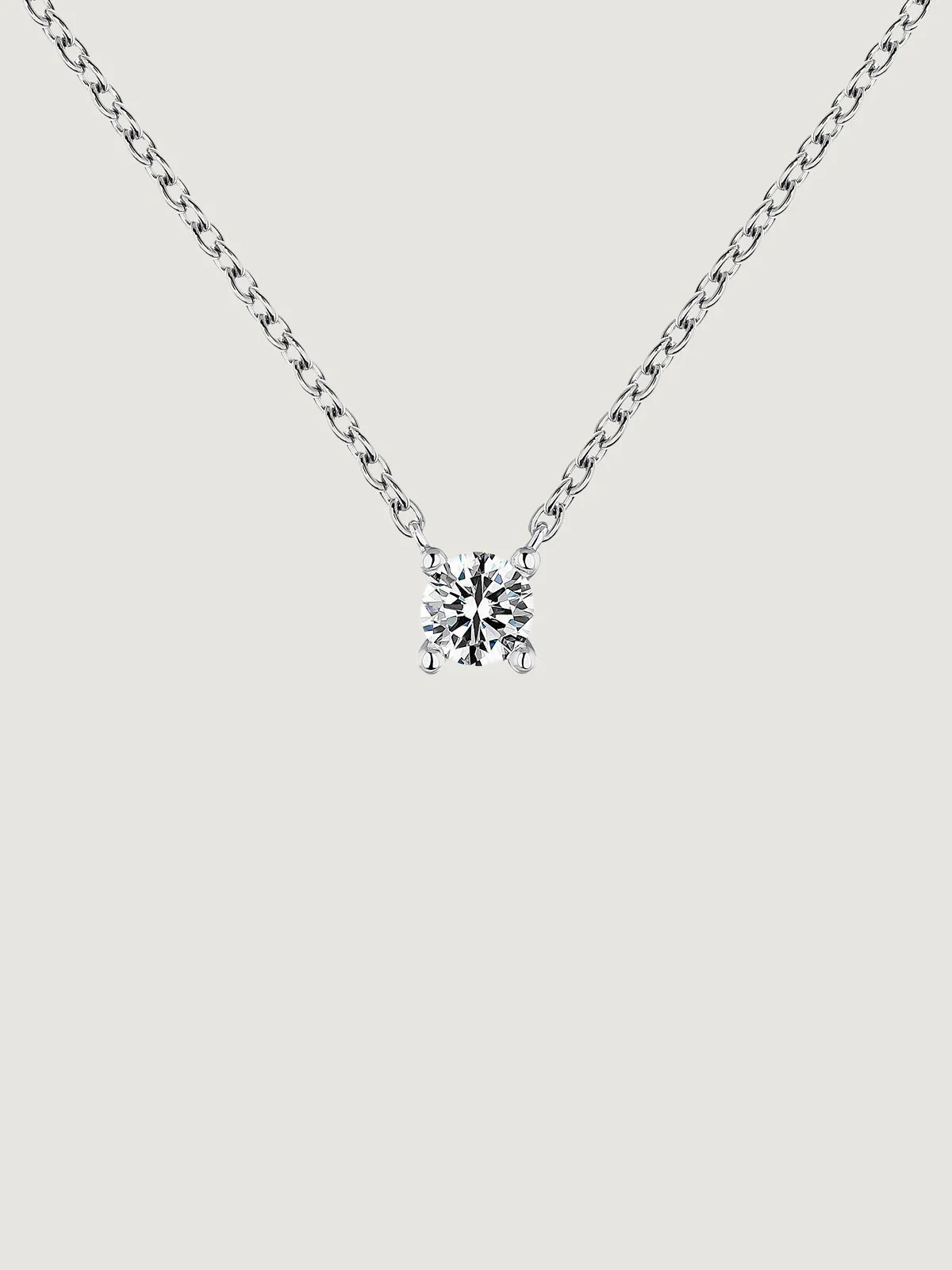 Colgante solitario de oro blanco de 18K con diamante de 0,15cts