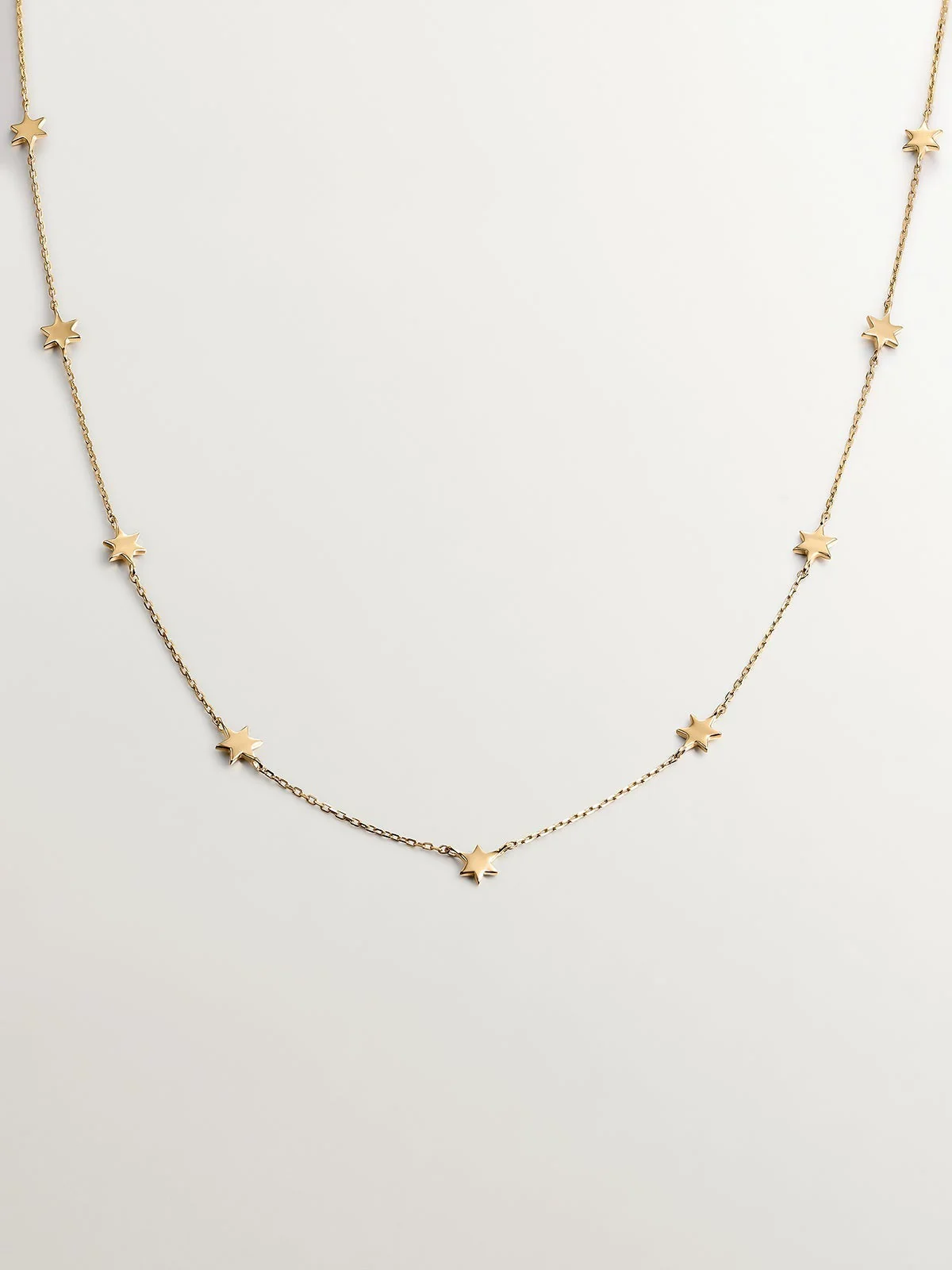 Collar de oro amarillo de 9K con estrellas