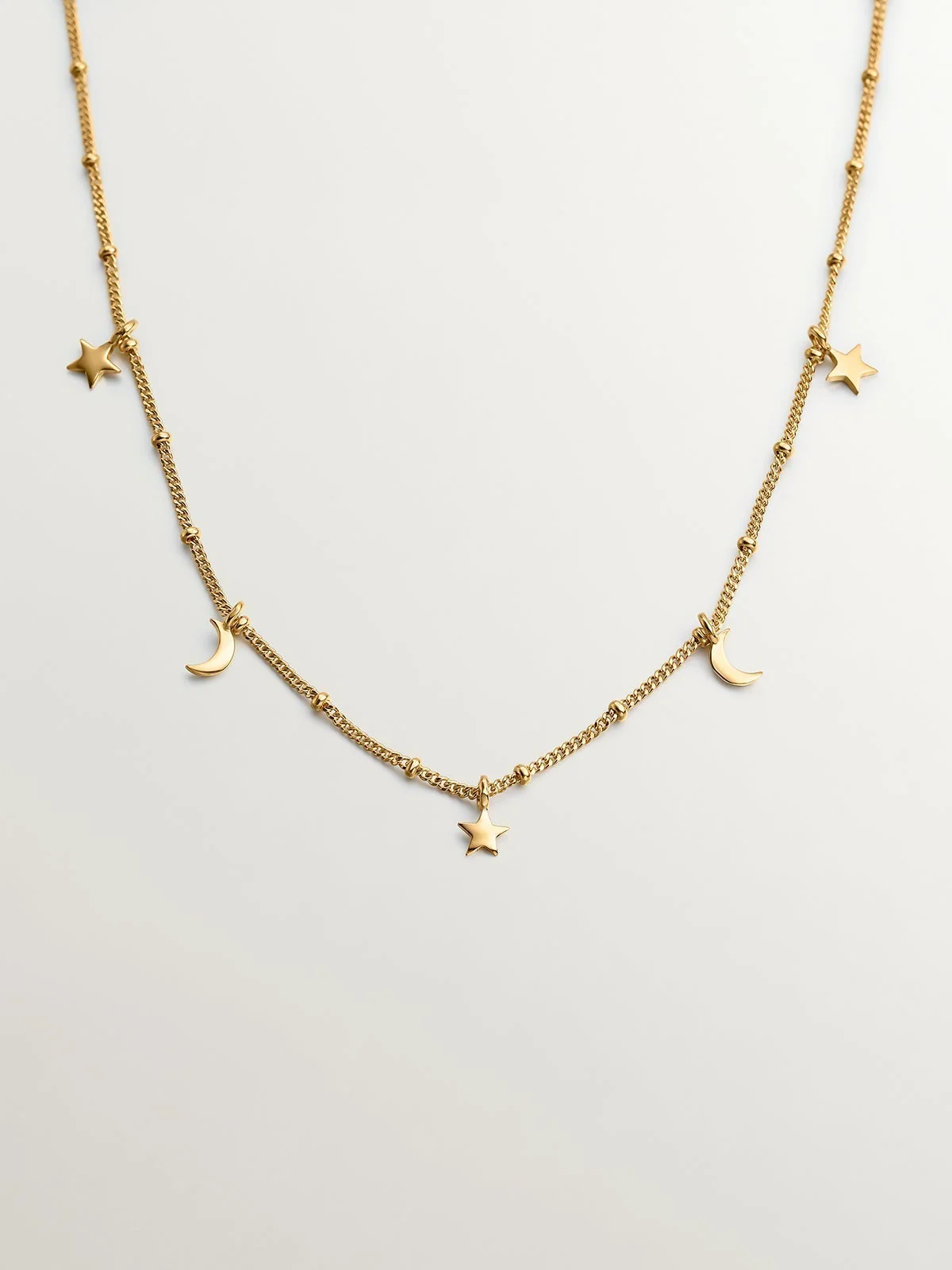 Collar de plata 925 bañada en oro amarillo de 18K con estrellas y lunas