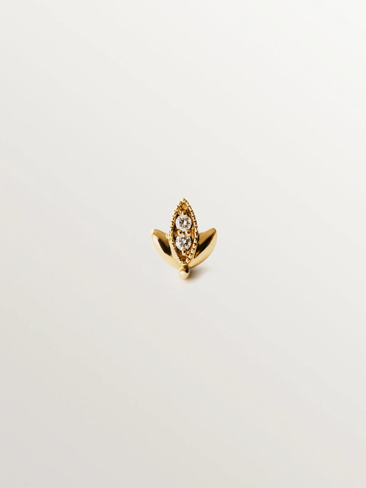 Piercing de oro amarillo de 18K con diamantes en talla brillante