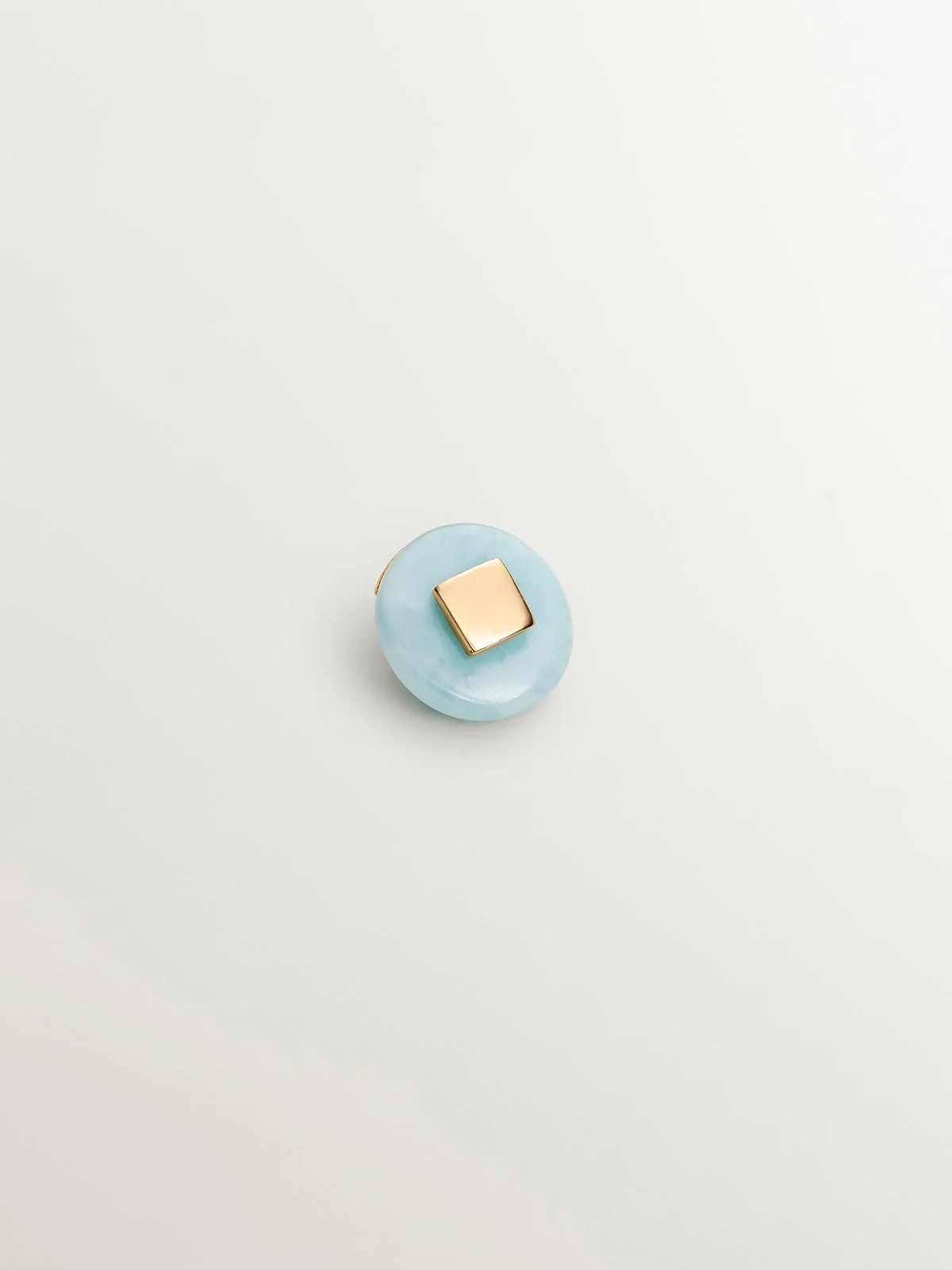 Pendiente individual de oro amarillo de 9K con larimar azul
