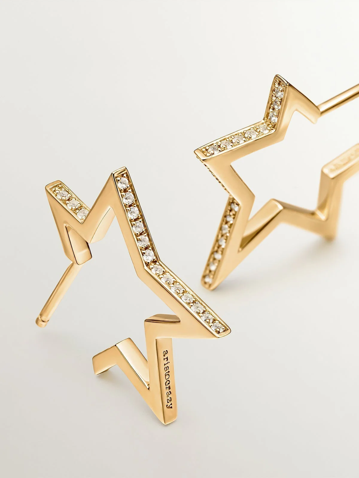 Pendientes de plata 925 bañada en oro amarillo de 18K con forma de estrella y topacios blancos - Image 5