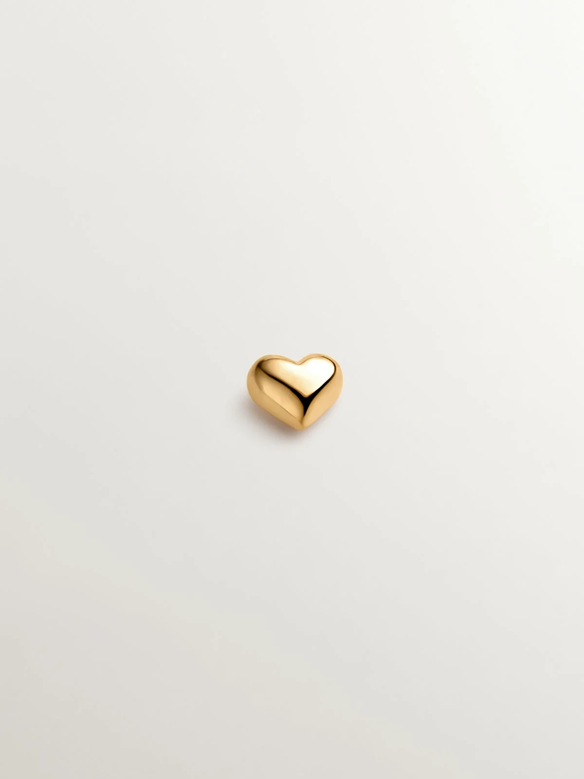 Piercing de oro amarillo de 18K con forma de corazón