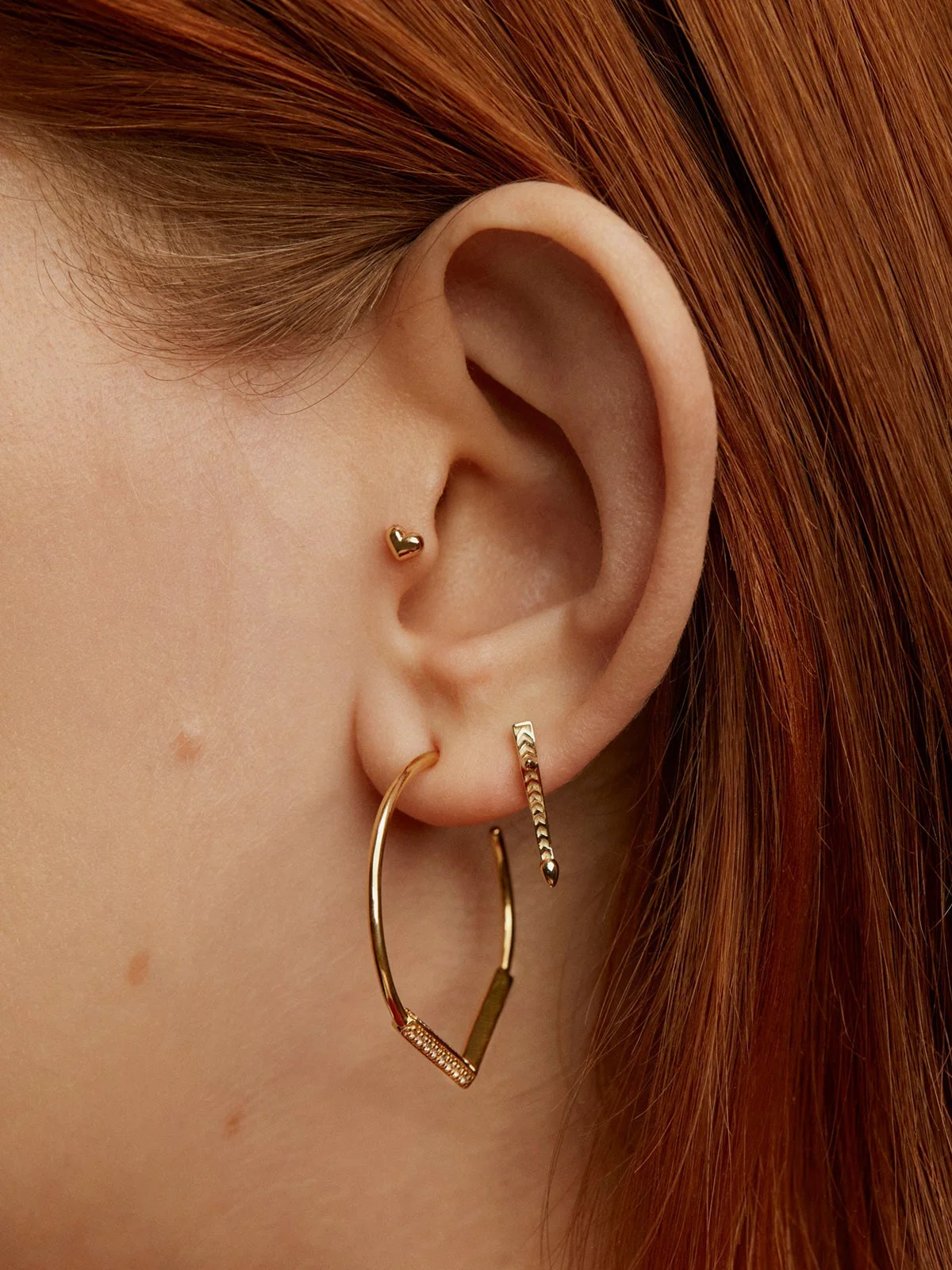 Piercing de oro amarillo de 18K con forma de corazón - Image 7