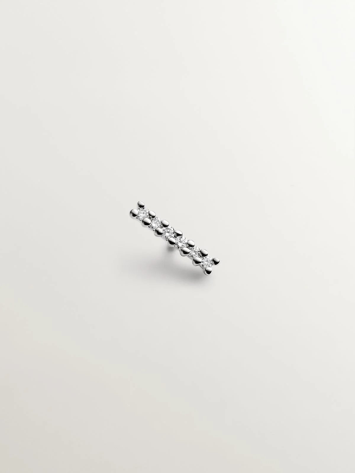 Piercing de oro blanco de 18K con diamantes en talla brillante de 0,02 cts