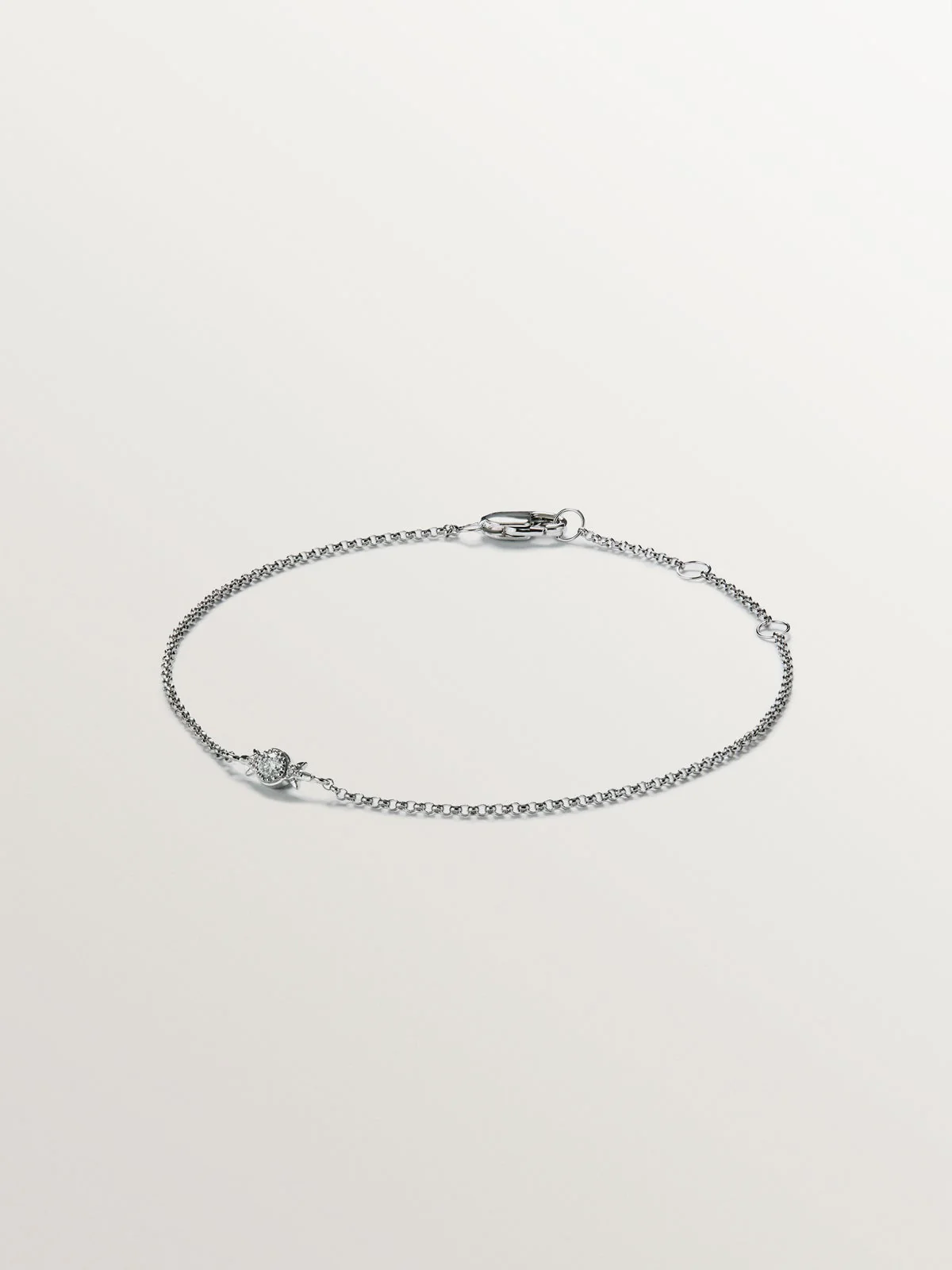 Pulsera de eslabones rolo de oro blanco de 18K con diamante