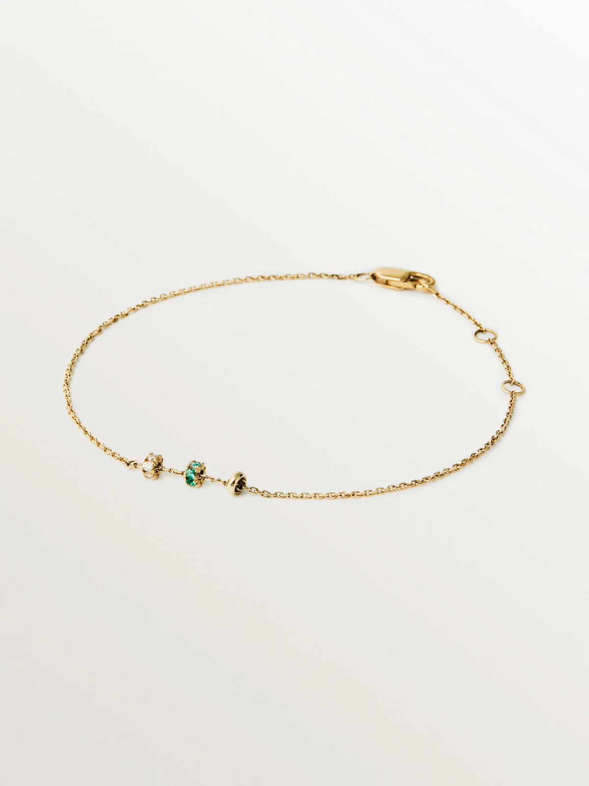 Pulsera de oro amarillo de 9K con esmeraldas y diamantes