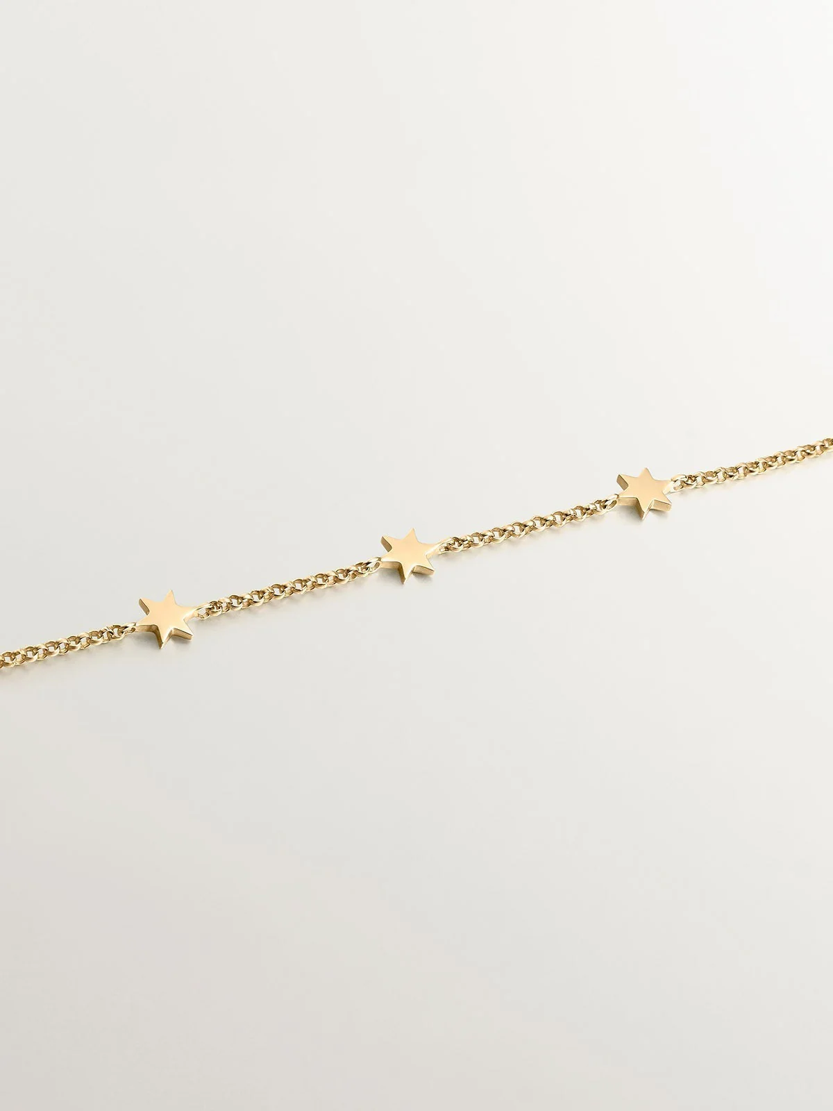 Pulsera de oro amarillo de 9K con estrellas - Image 3