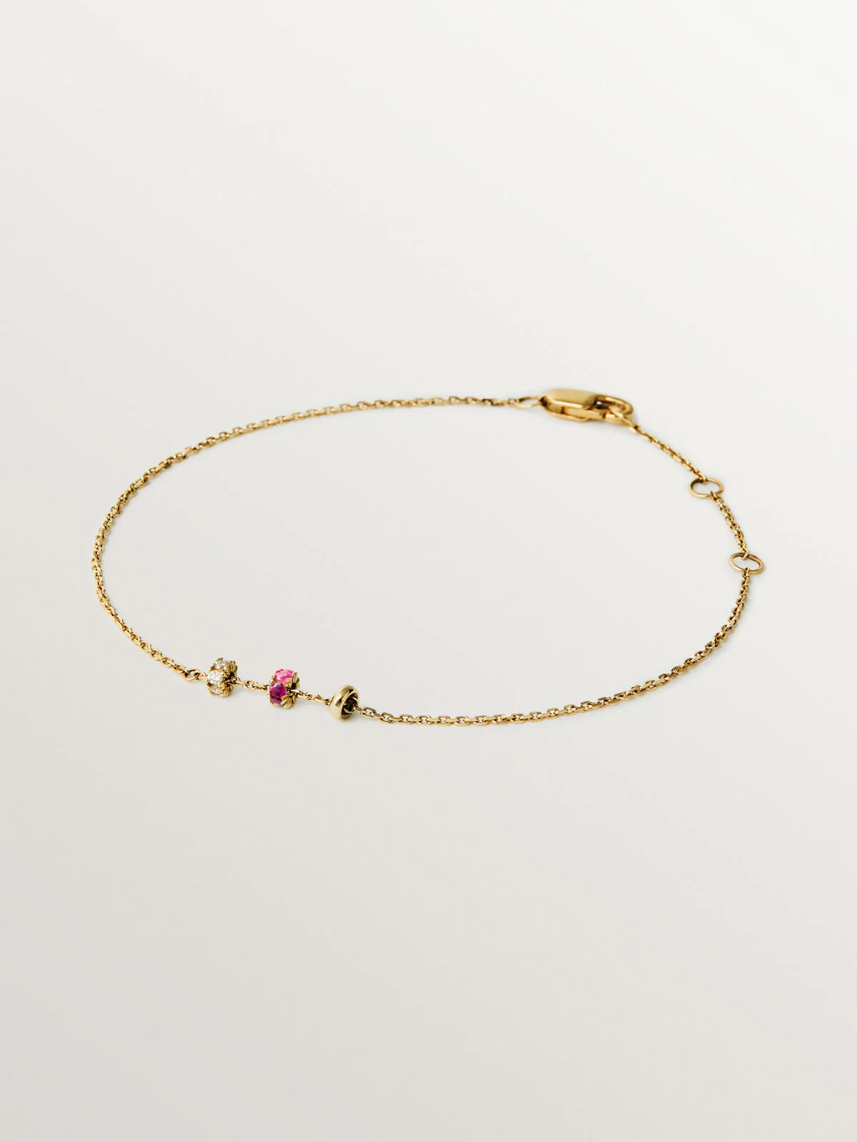 Pulsera de oro amarillo de 9K con rubís y diamantes