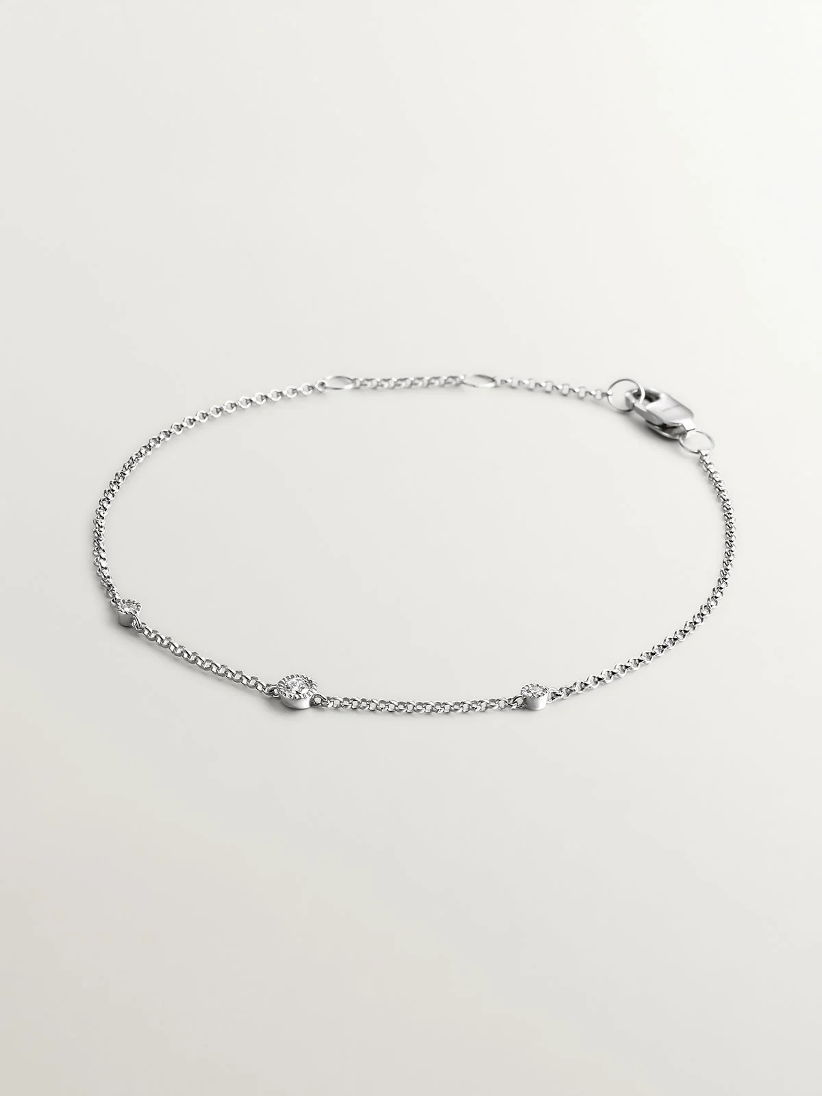 Pulsera de oro blanco de 18K con diamante ISI2 0,097 cts