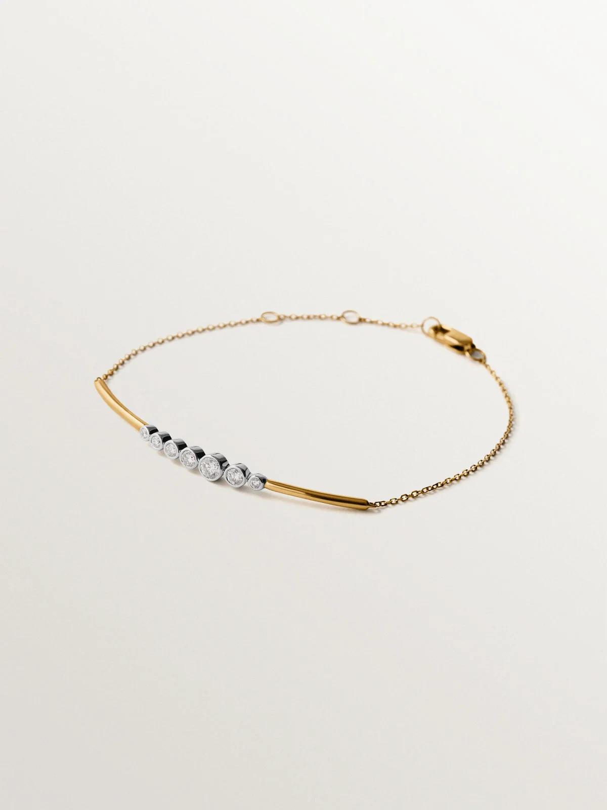 Pulsera de oro blanco y amarillo de 9K con diamantes