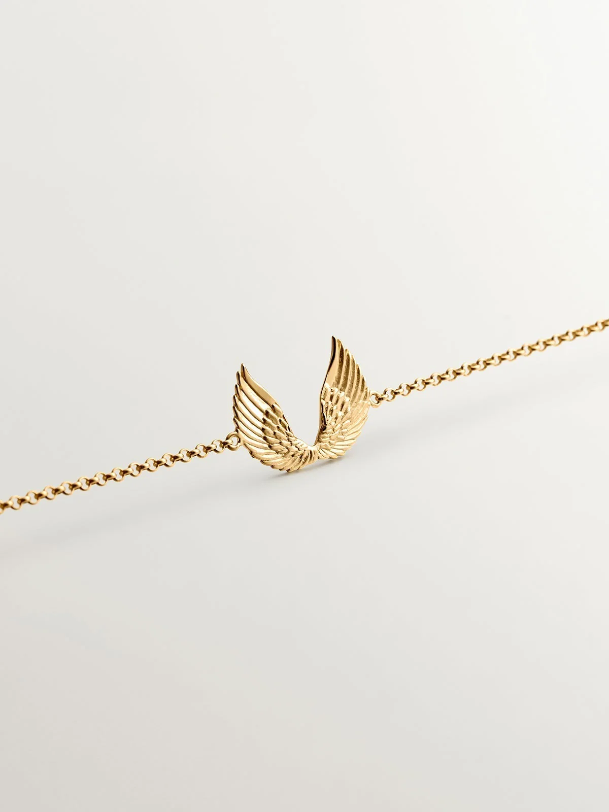 Pulsera de plata 925 bañada en oro amarillo de 18K con alas - Image 5