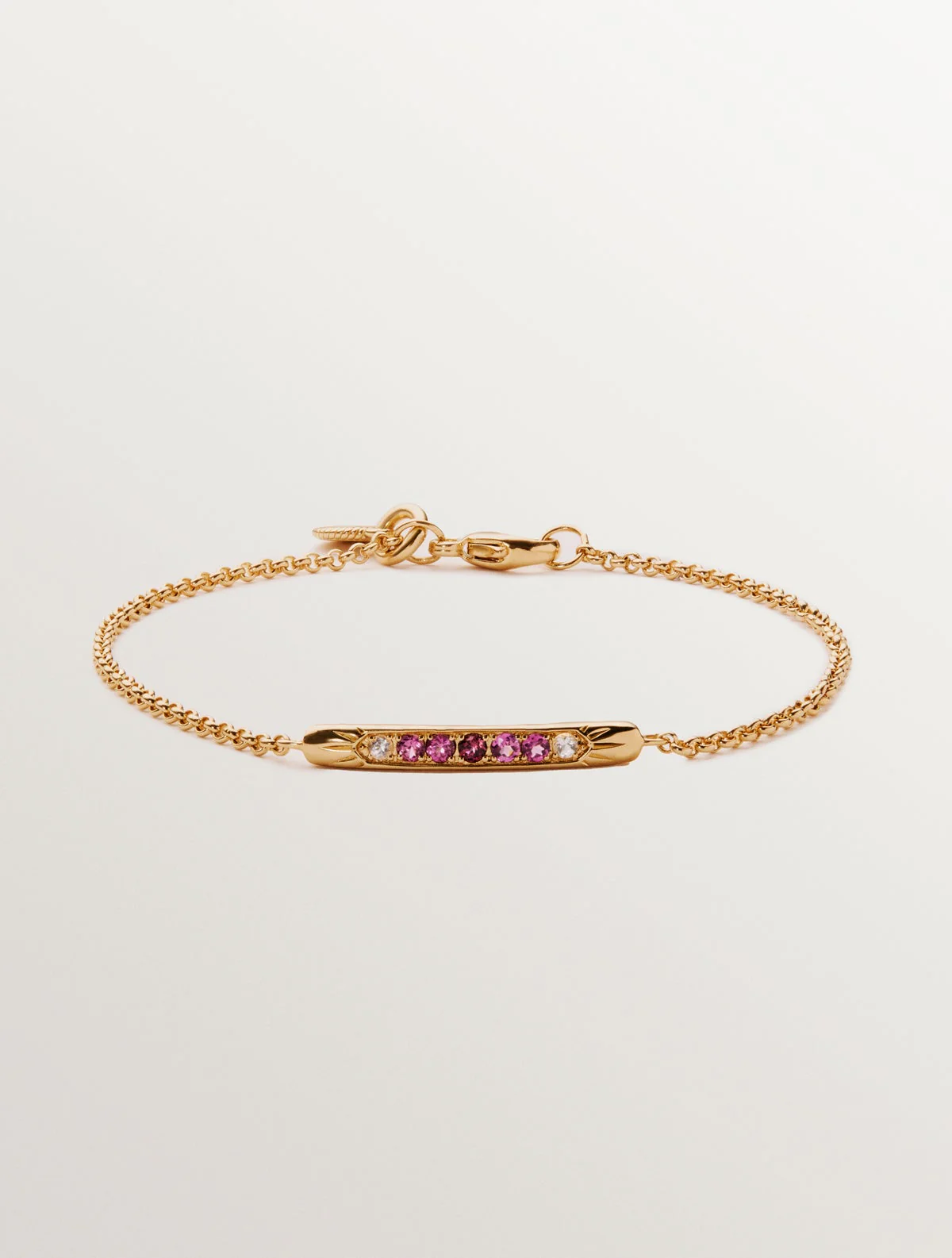 Pulsera de plata 925 bañada en oro amarillo de 18K con rodolitas moradas y topacios blancos