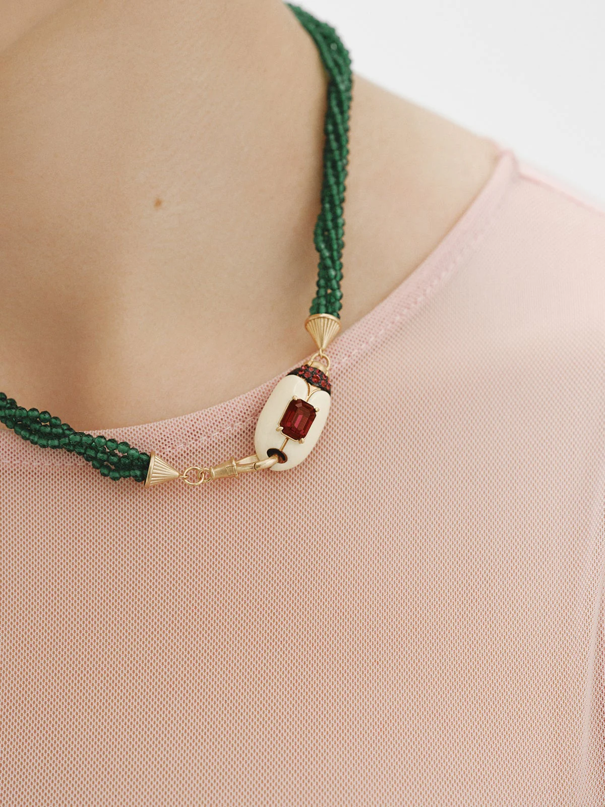 Yellow gold-plated necklace with green crystal beads and beetle shape with purple crystals - Image 2